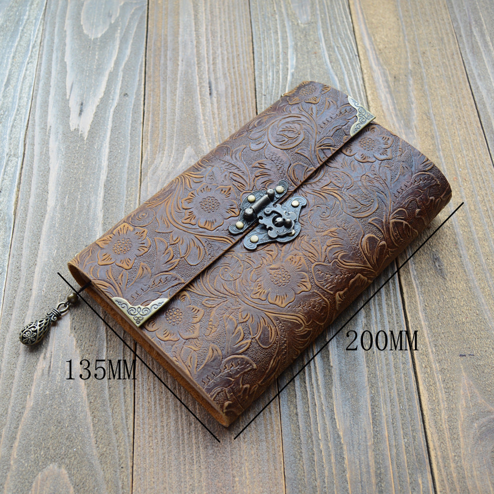 Brown embossed leather journal with its size marked, 200 by 135 mm