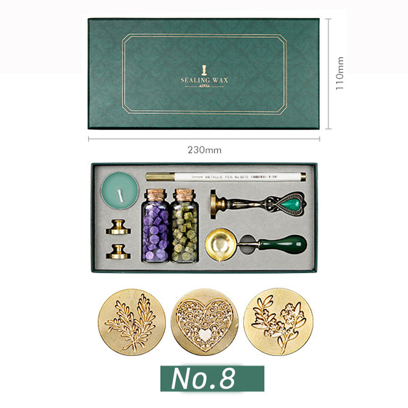 Wax seal kit with leaf sprig, lace heart and blossom branch stamp heads, purple and olive wax beads, green box