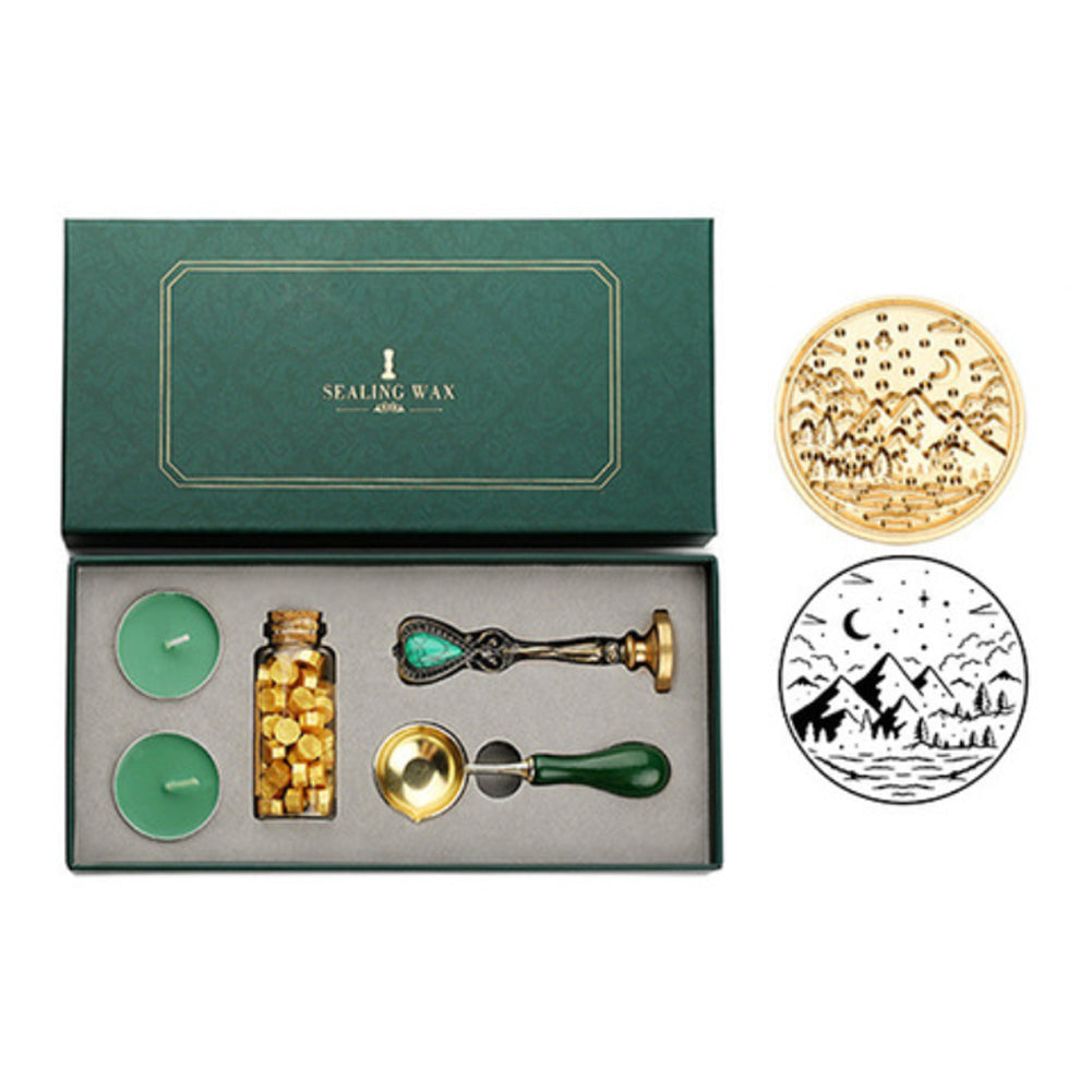 Wax seal set with mountain night stamp showing peaks, pines, moon and stars, plus gold wax beads and spoon