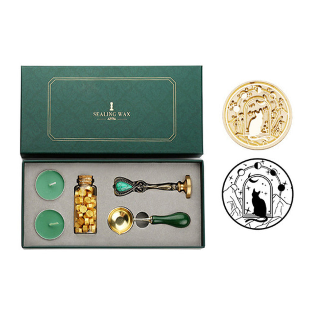 Wax seal set with cat-in-an-arch and moon phases stamp, gold wax beads, tea lights and spoon in a green box