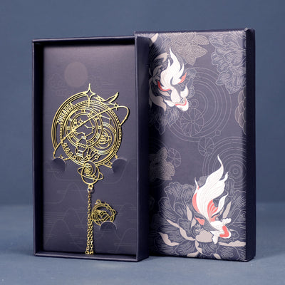 Aquarius zodiac bookmark in brass-tone metal with chain and charm in a dark blue gift box